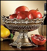 Conjuring visions of the heavy-laden groaning boards at the Feast of Camelot, this Medieval-style vessel is ready to be filled to overflowing. Rising from a pert base, generously sloped sides are embellished, exclusively for Design Toscano, with sculptural fleur-de-lis and marks of the Gothic realm. Our designer resin work is hand-painted and brushed with accents of faux gold and silver for display.